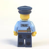 LEGO Minifigure-Police - City Shirt with Dark Blue Tie and Gold Badge, Dark Tan Belt with Radio, Dark Blue Legs, Police Hat with Gold Badge, Lopsided Grin-Town / City / Police-CTY743-Creative Brick Builders
